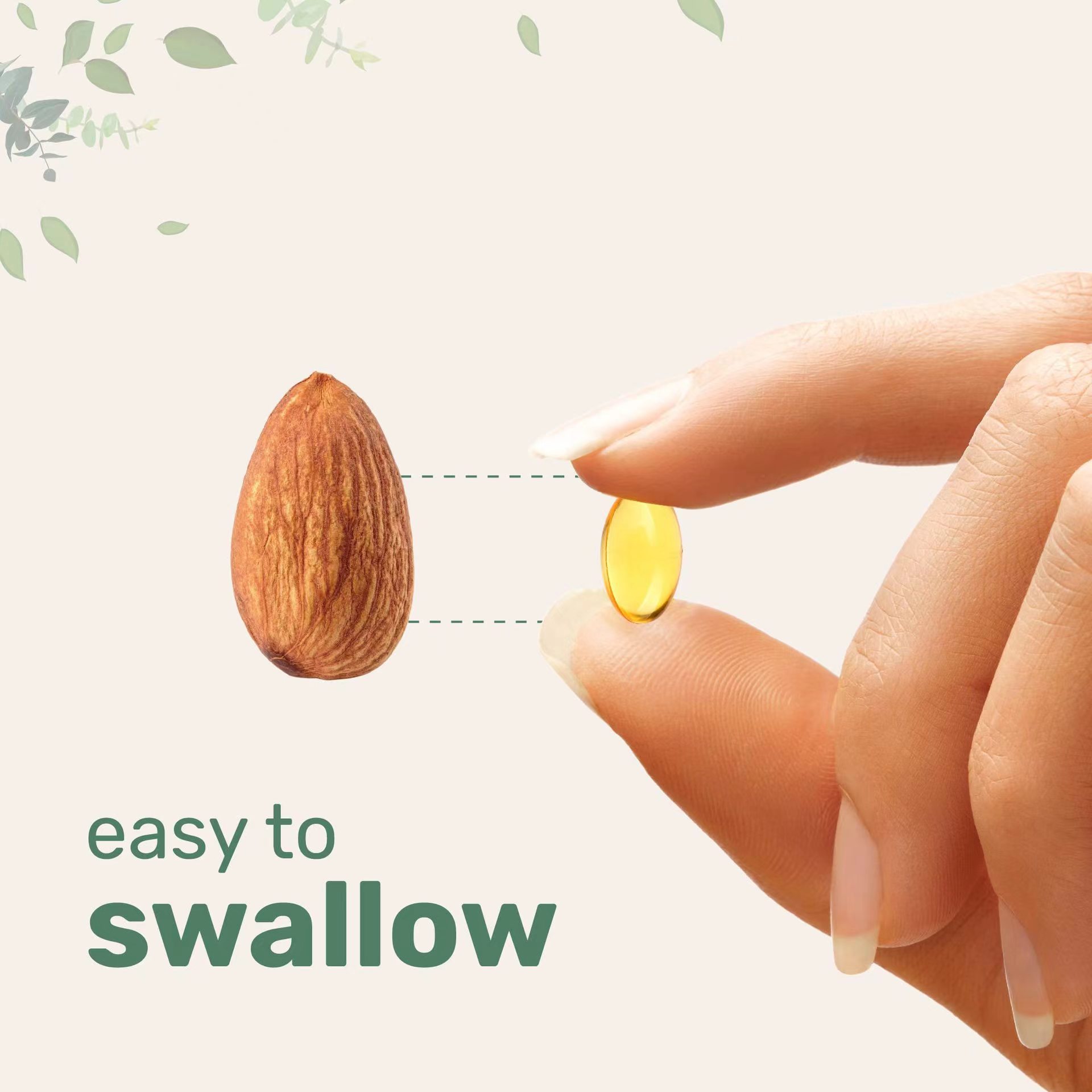 Hand holding a single golden softgel next to an almond, showing small, easy-to-swallow size