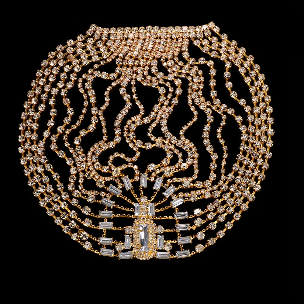 Geometric crystal pendant anchoring layered headpiece