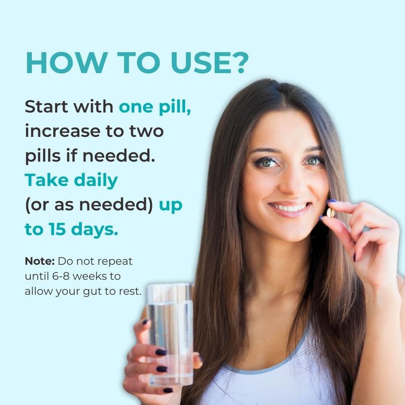 Woman taking 15 Day Cleanse capsule with water, starting her gut reset