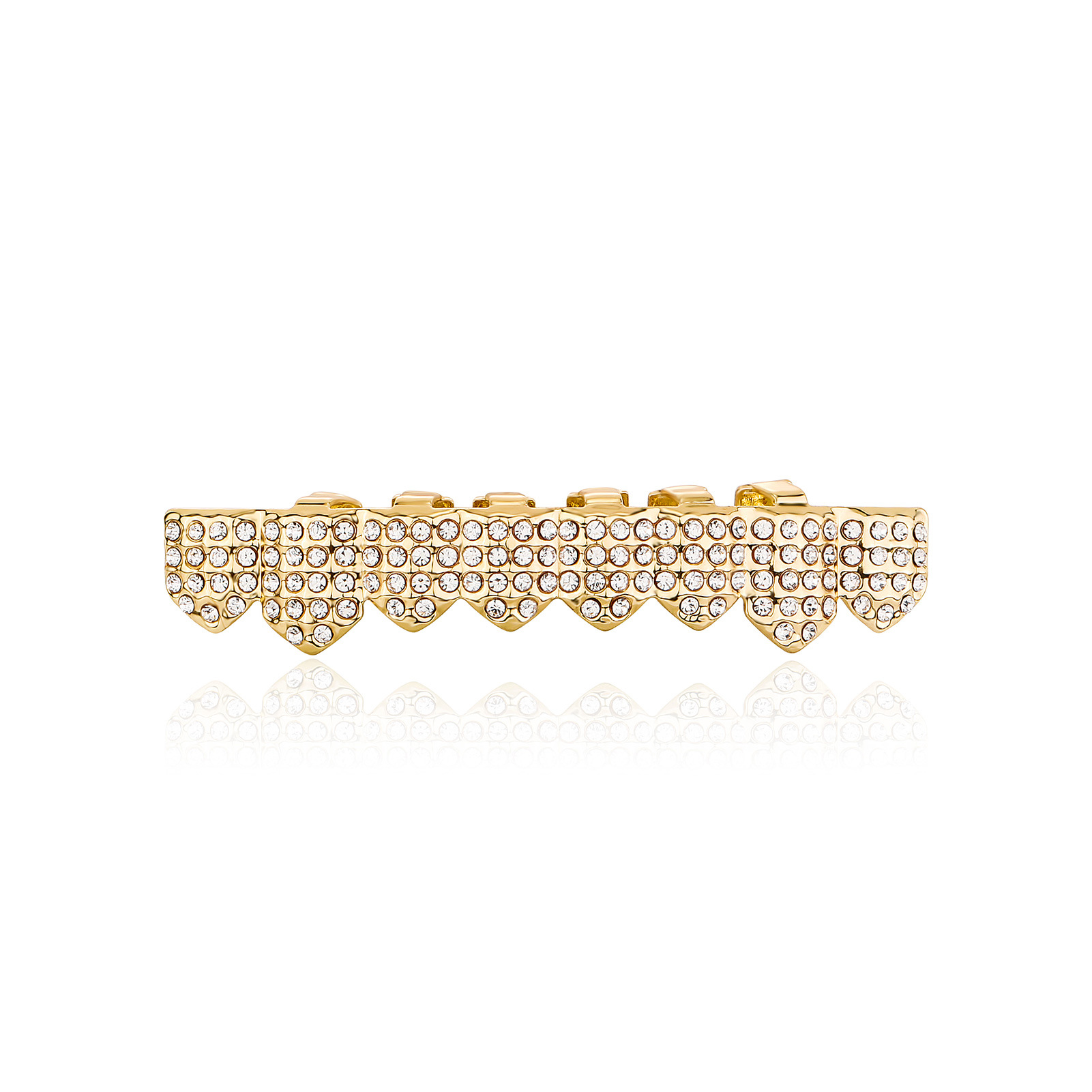 Person holding the gold grillz set, about to snap them on, with an excited expression
