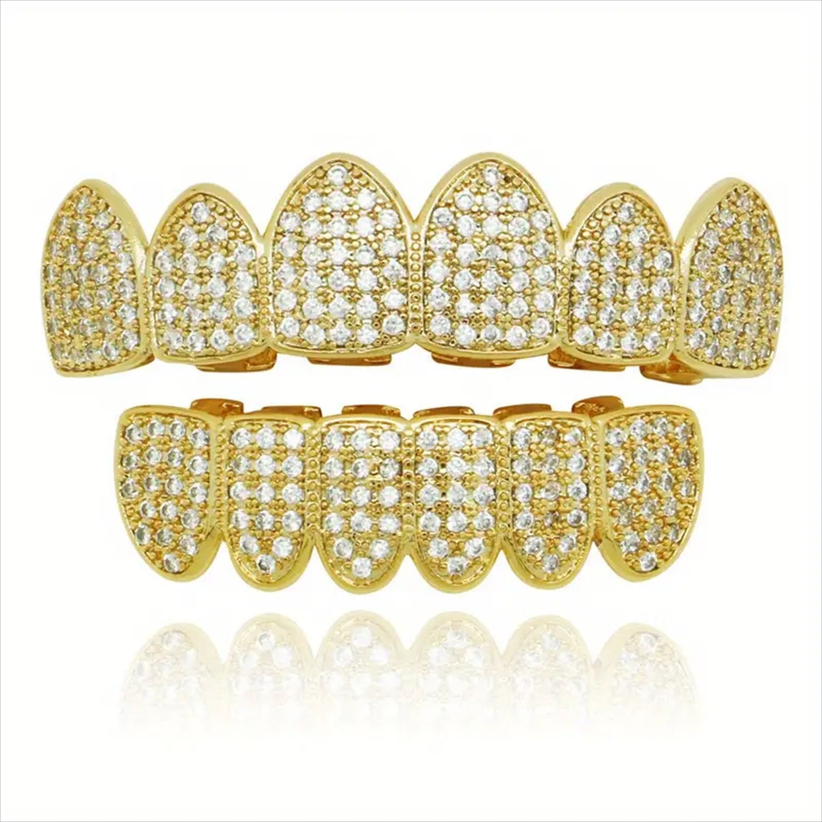 Gold-tone CZ grillz top and bottom set on white background, showing complete set with stone density