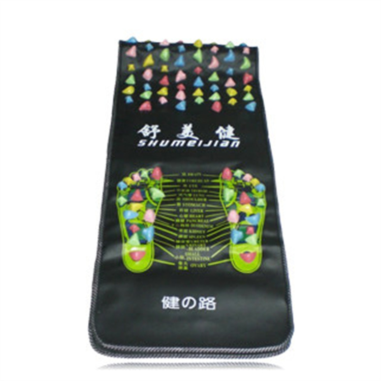 Dense array of multi-colored pyramid-shaped acupressure nodes showing comprehensive coverage on the mat surface