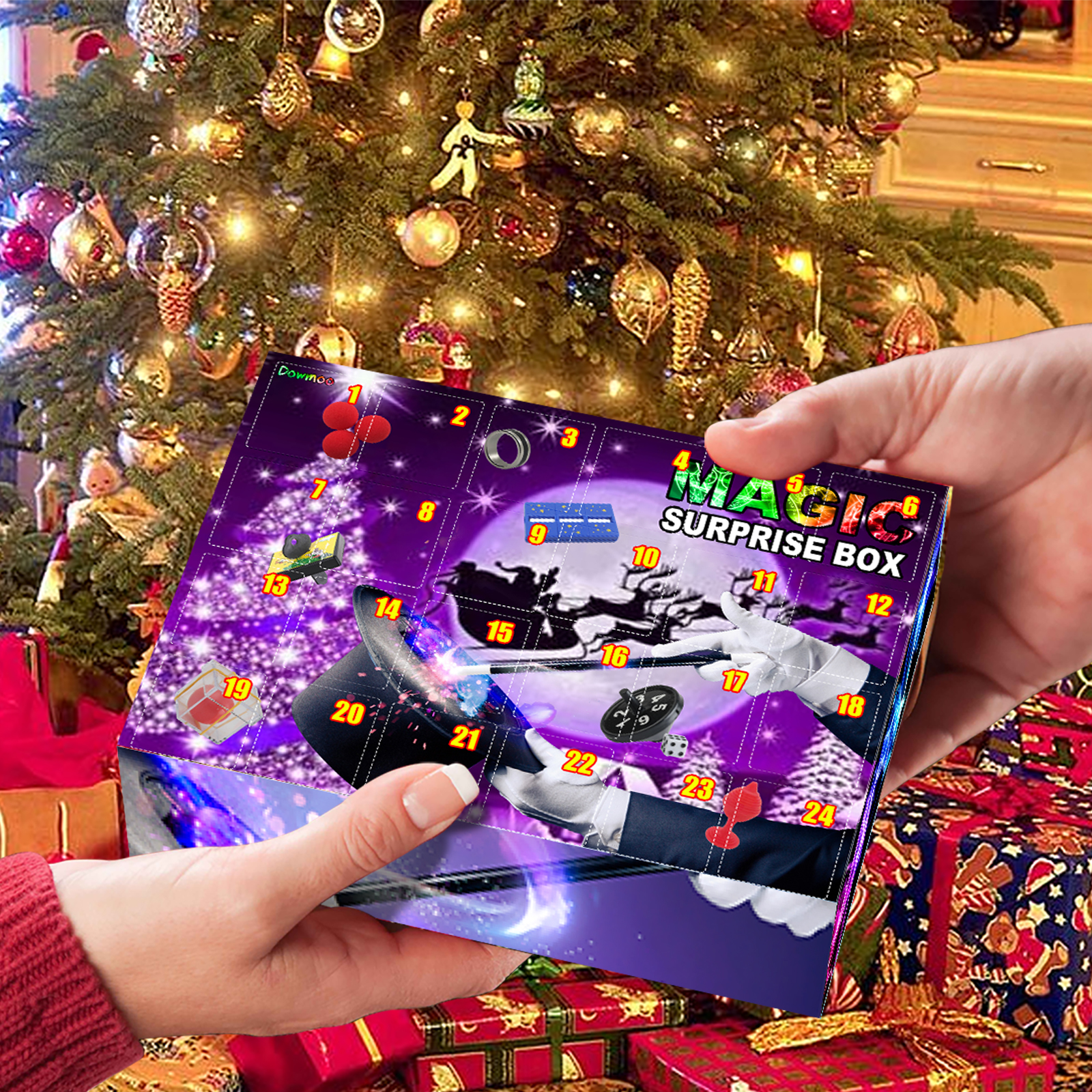 Christmas magic gift box held beside tree and wrapped presents