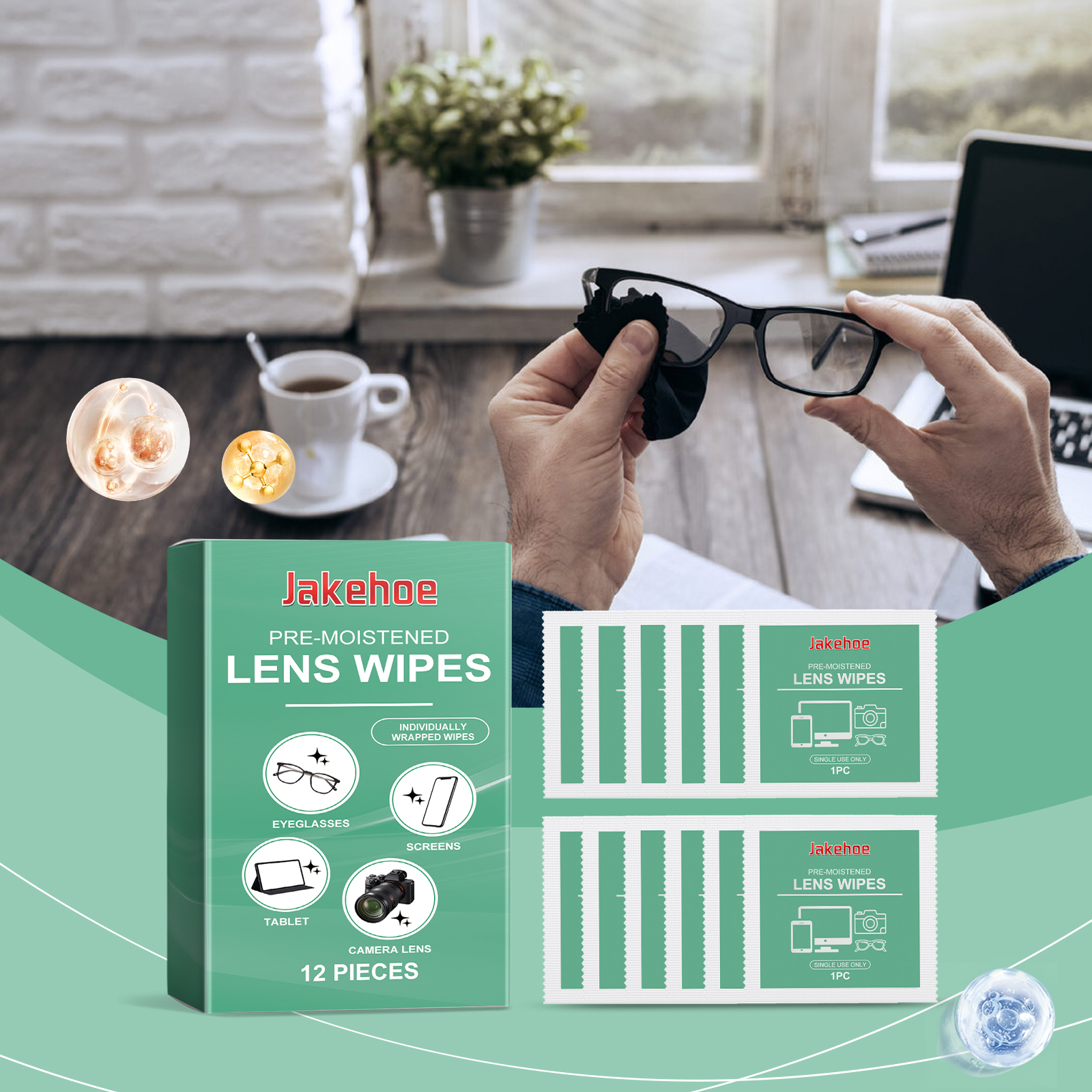 Person using a lens wipe beside laptop and glasses