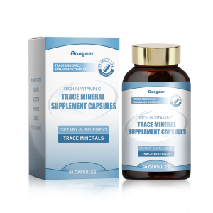 Trace Mineral Supplement Capsules packaging and bottle on matte ivory ceramic tile with smooth river pebbles