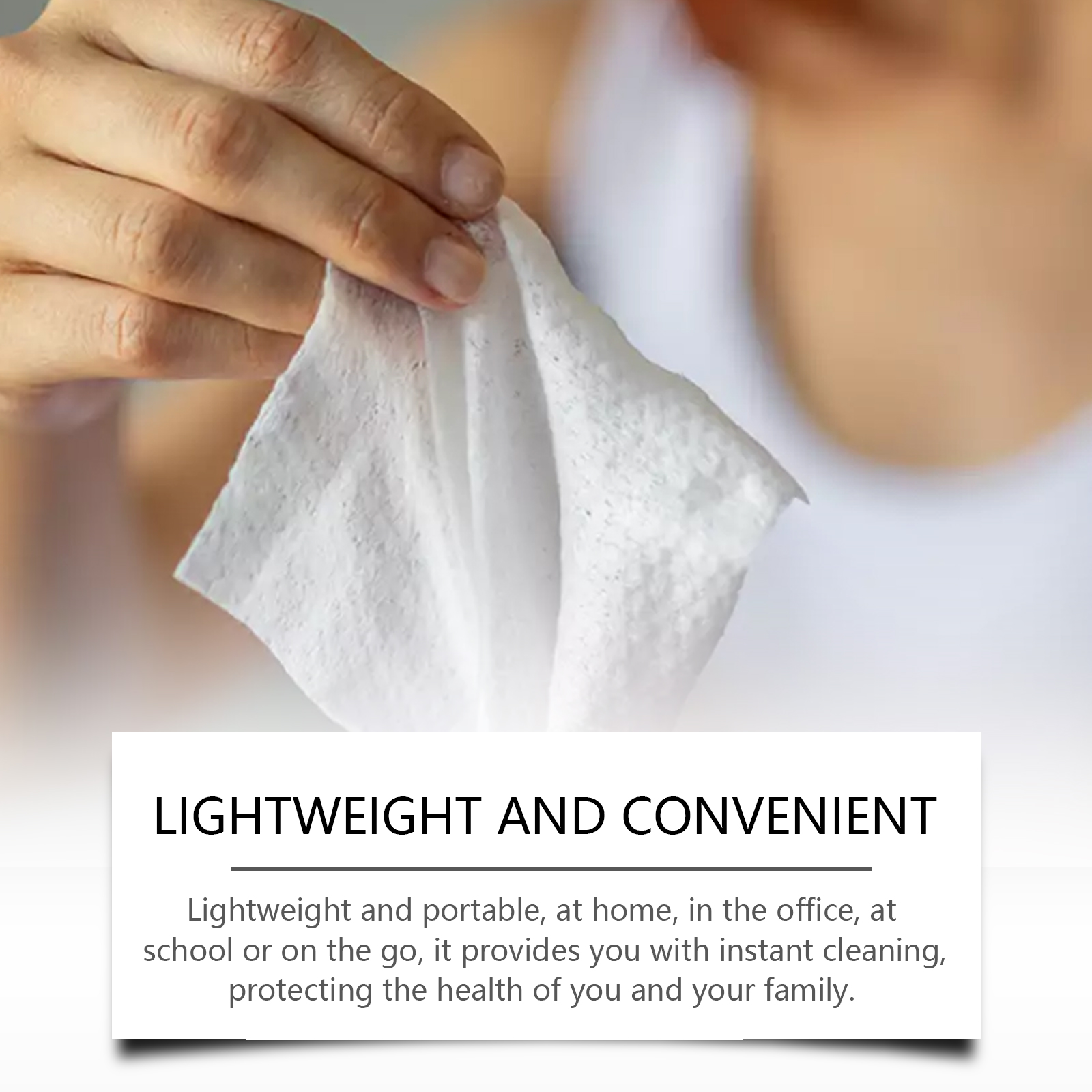 Folded white textured wipe held in one hand