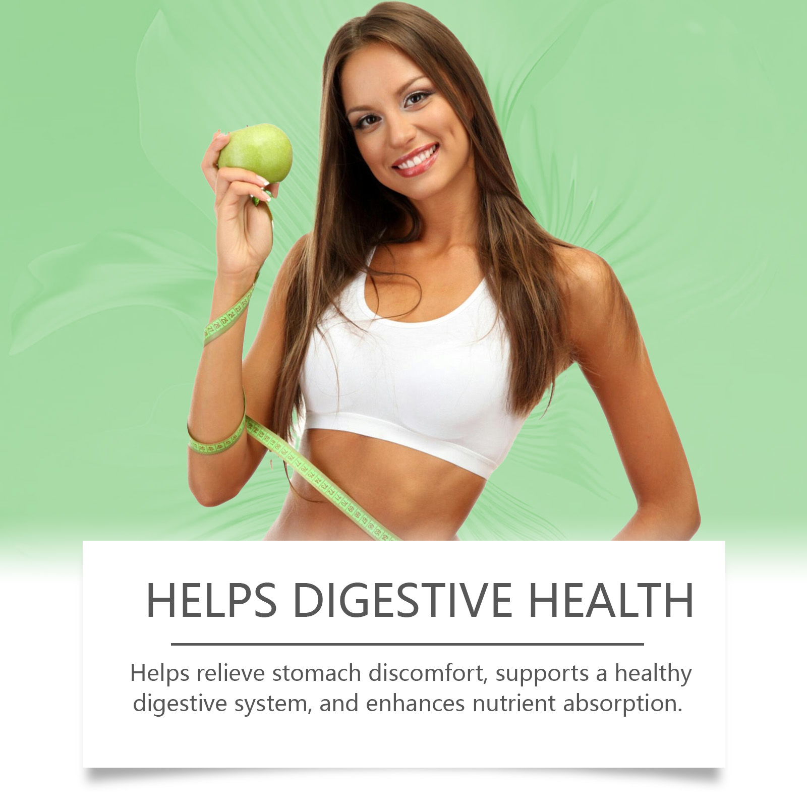 Healthy woman in white sports crop holding green apple with measuring tape, radiating wellness