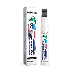 Portable automotive paint pen beside its protective box
