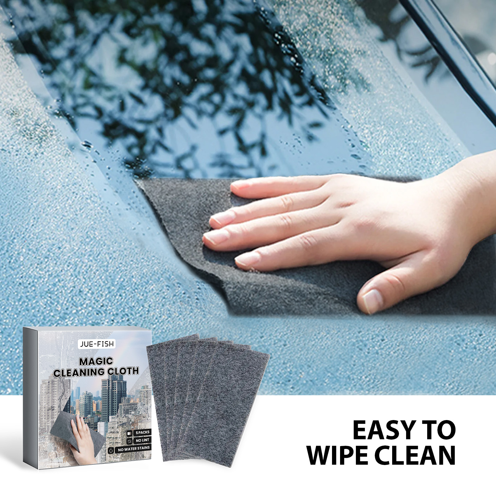 Dark gray cloth wiping droplets from a car windshield