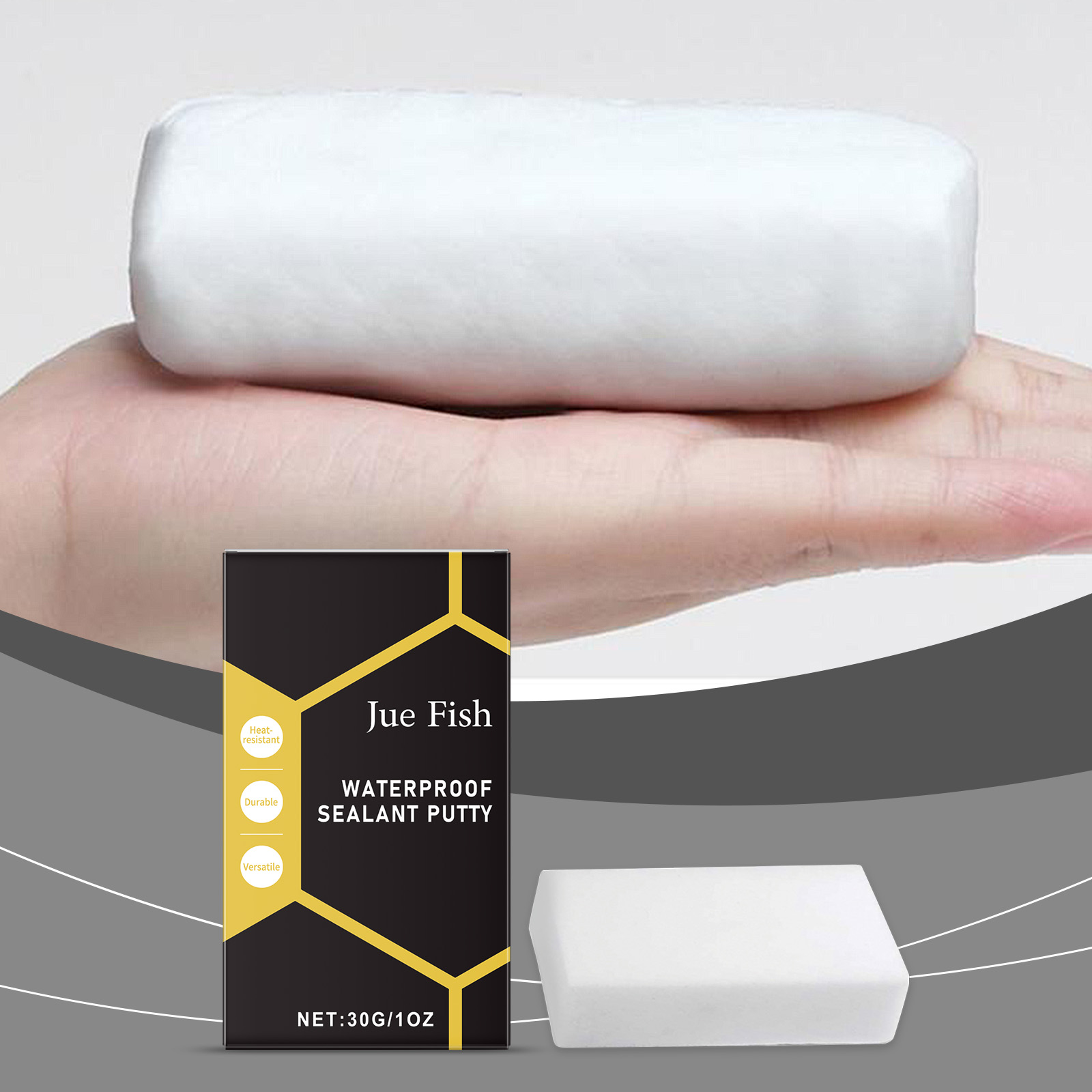 Hand holding smooth white rectangular repair putty