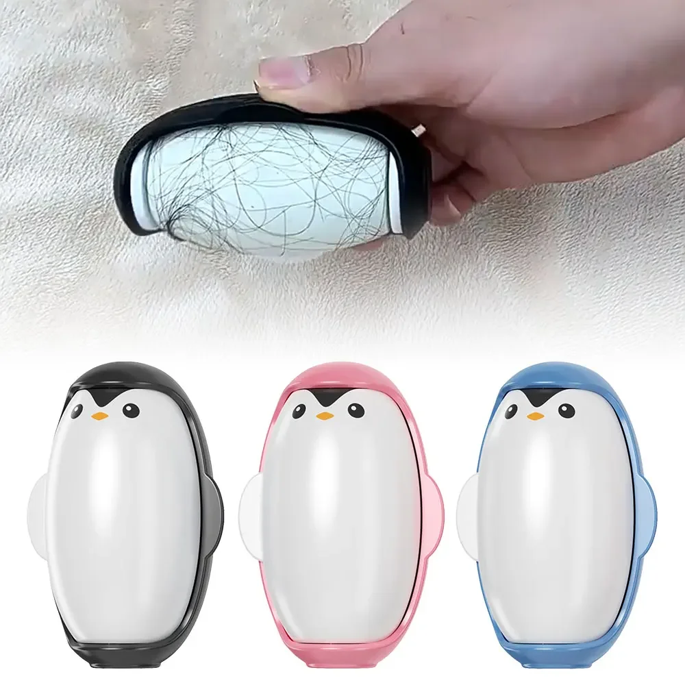 Close-up of the black penguin lint roller sticky surface capturing tangled hair and fibers