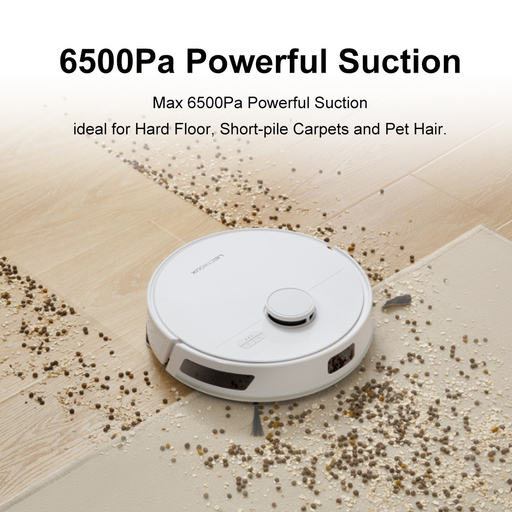 Close-up of dirt and pet hair being drawn into robot vacuum on hard floor