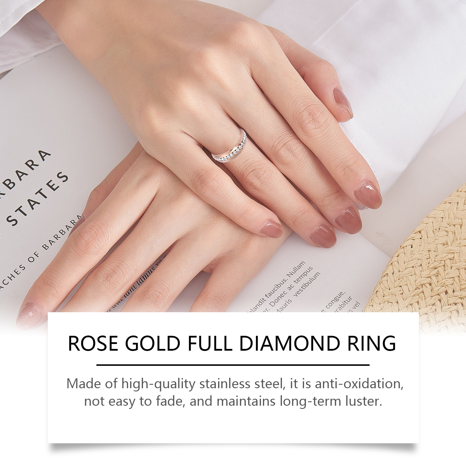 Ring worn near open book showing stainless steel material claim