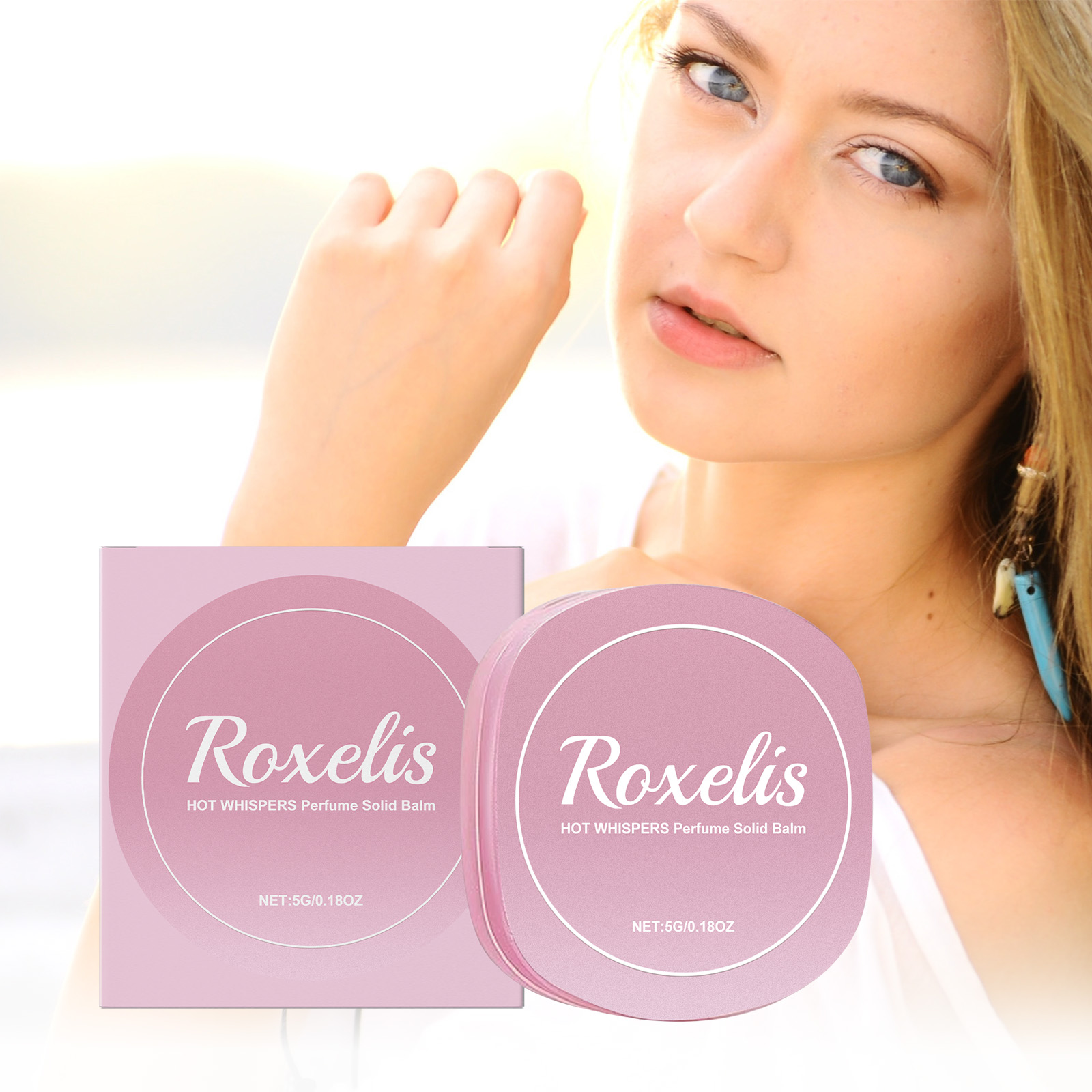 Woman holding rose-pink perfume balm for a quiet refresh
