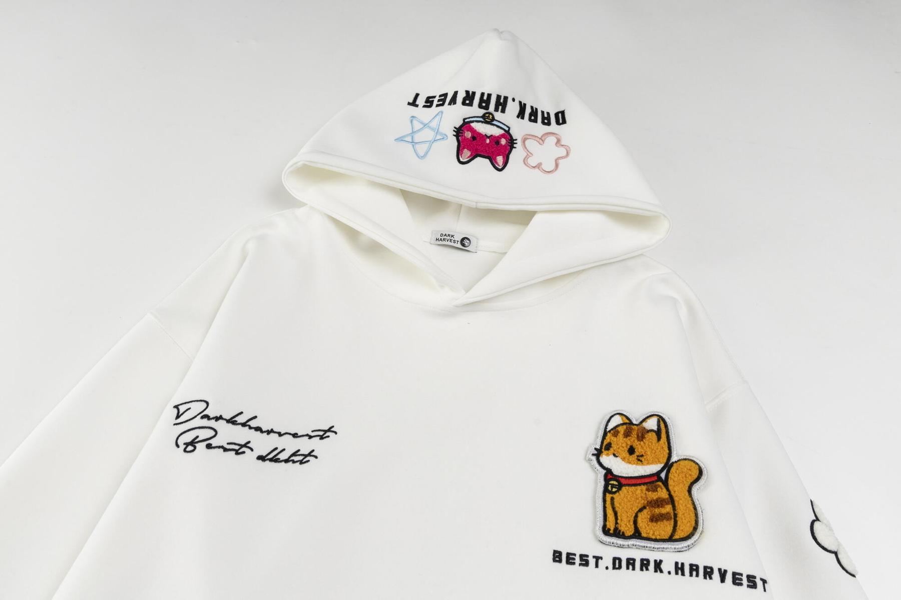 Embroidered sweatshirt lifestyle shot layered