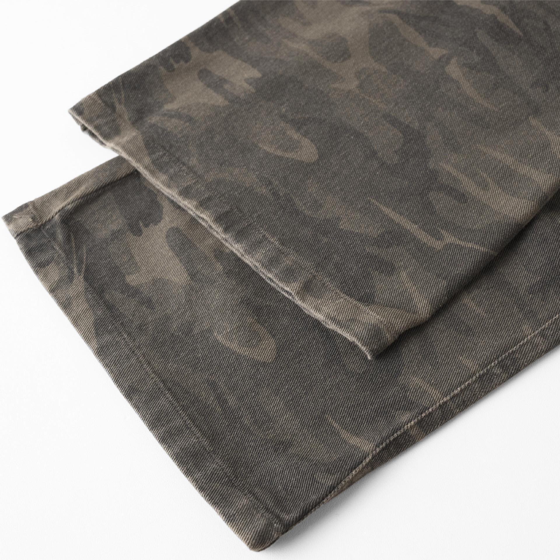 Pants laid flat with camouflage pattern