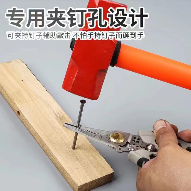 Wire stripper holding a nail during workshop repair