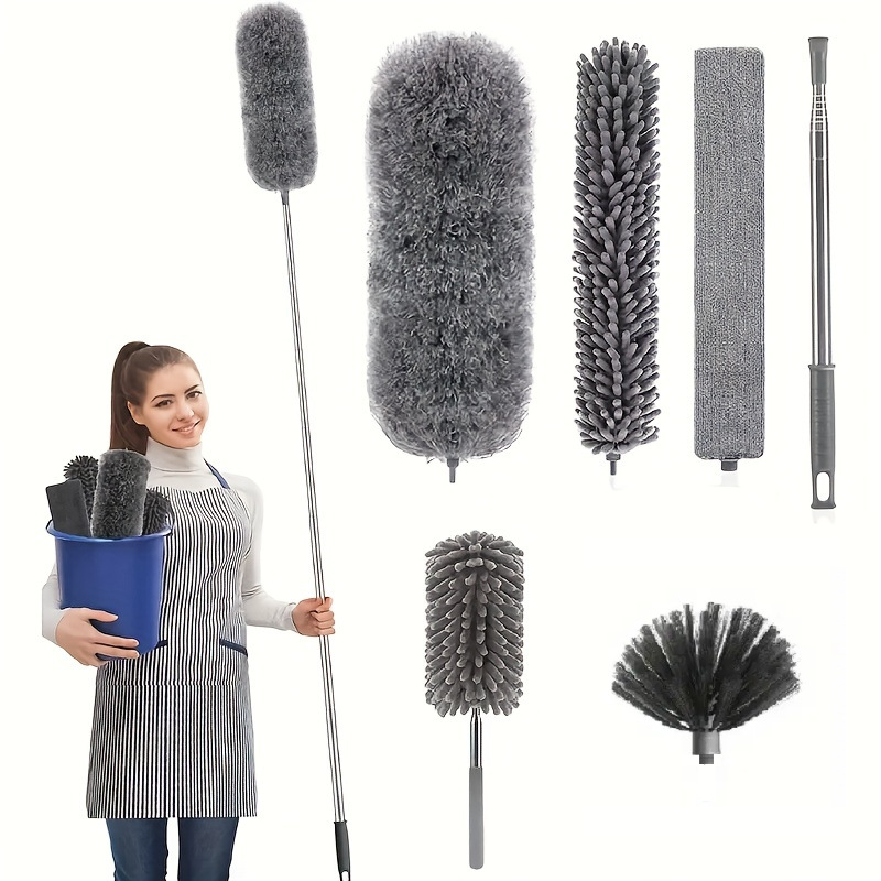 Woman holding a bucket of duster heads with the extended duster, all kit components visible around her