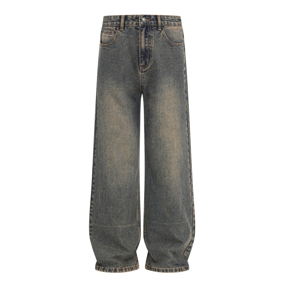 Loose washed blue jeans front view full length