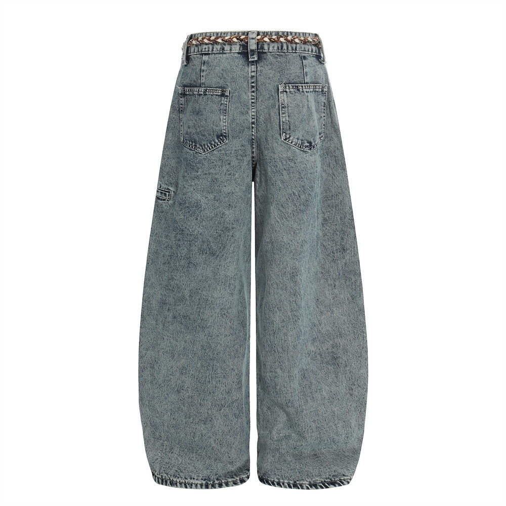 Black denim jeans zipper fly mid-rise waist detail