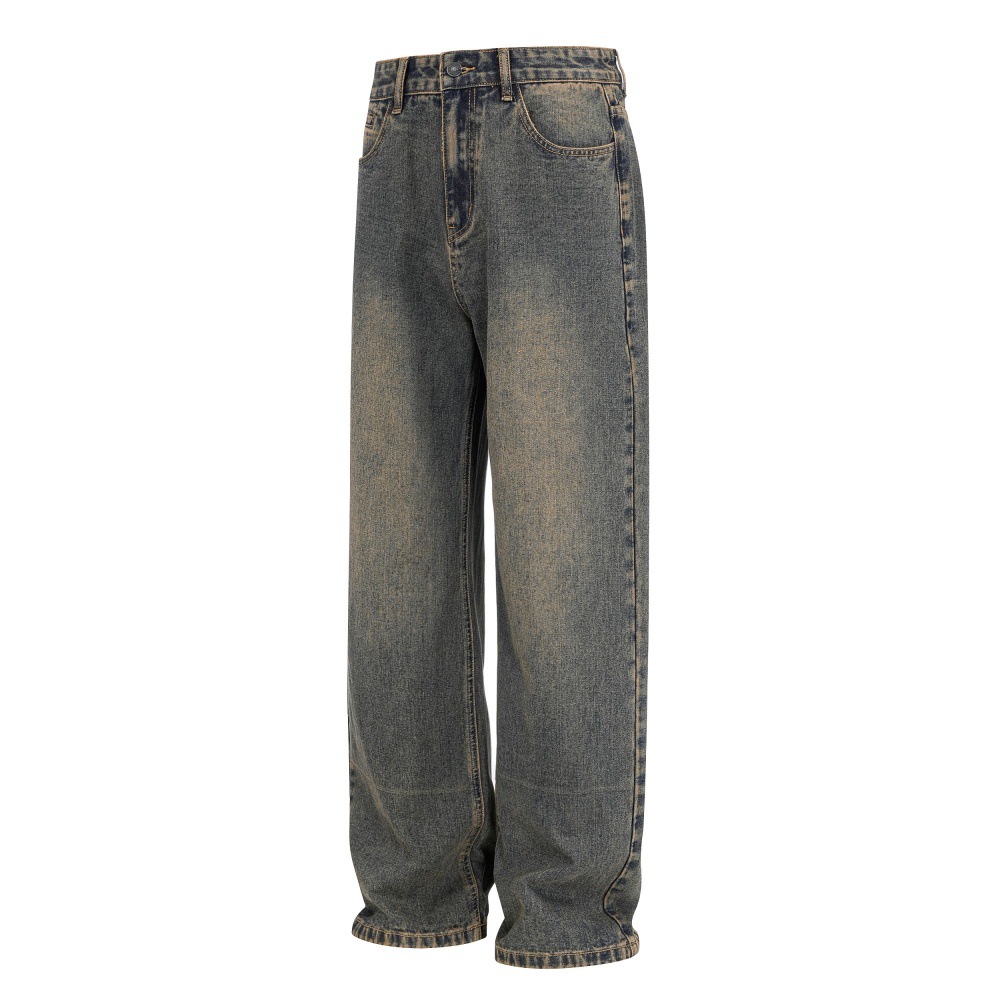 Distressed denim jeans blue side profile loose fit