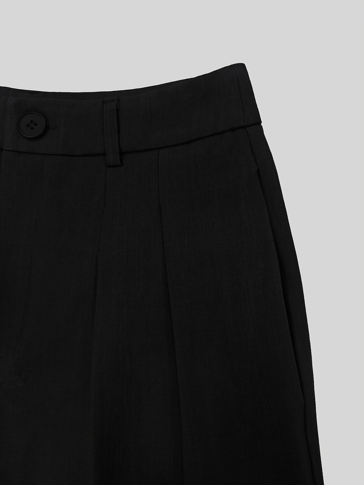 Women wearing navy blue high waist wide leg pants – detachable strap trouser look