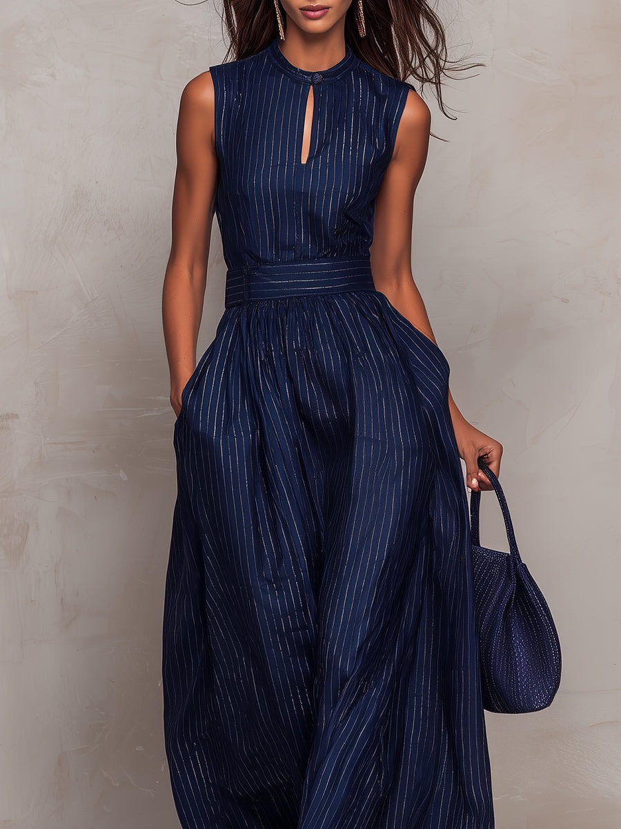 Navy blue wide-leg jumpsuit with pocket detail — close-up