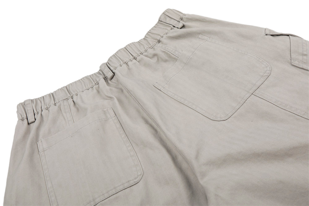 Herringbone patterned workwear with large pockets and shorts undefined