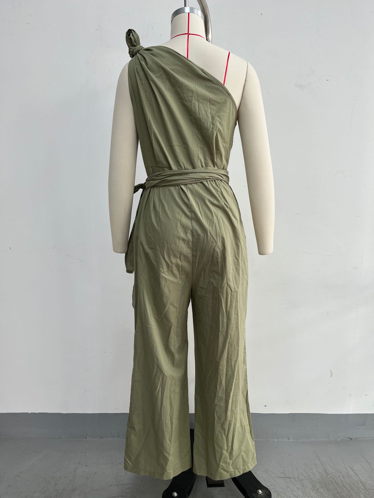 Women's sleeveless halter neck cinched waist slim jumpsuit in green – high waist casual chic