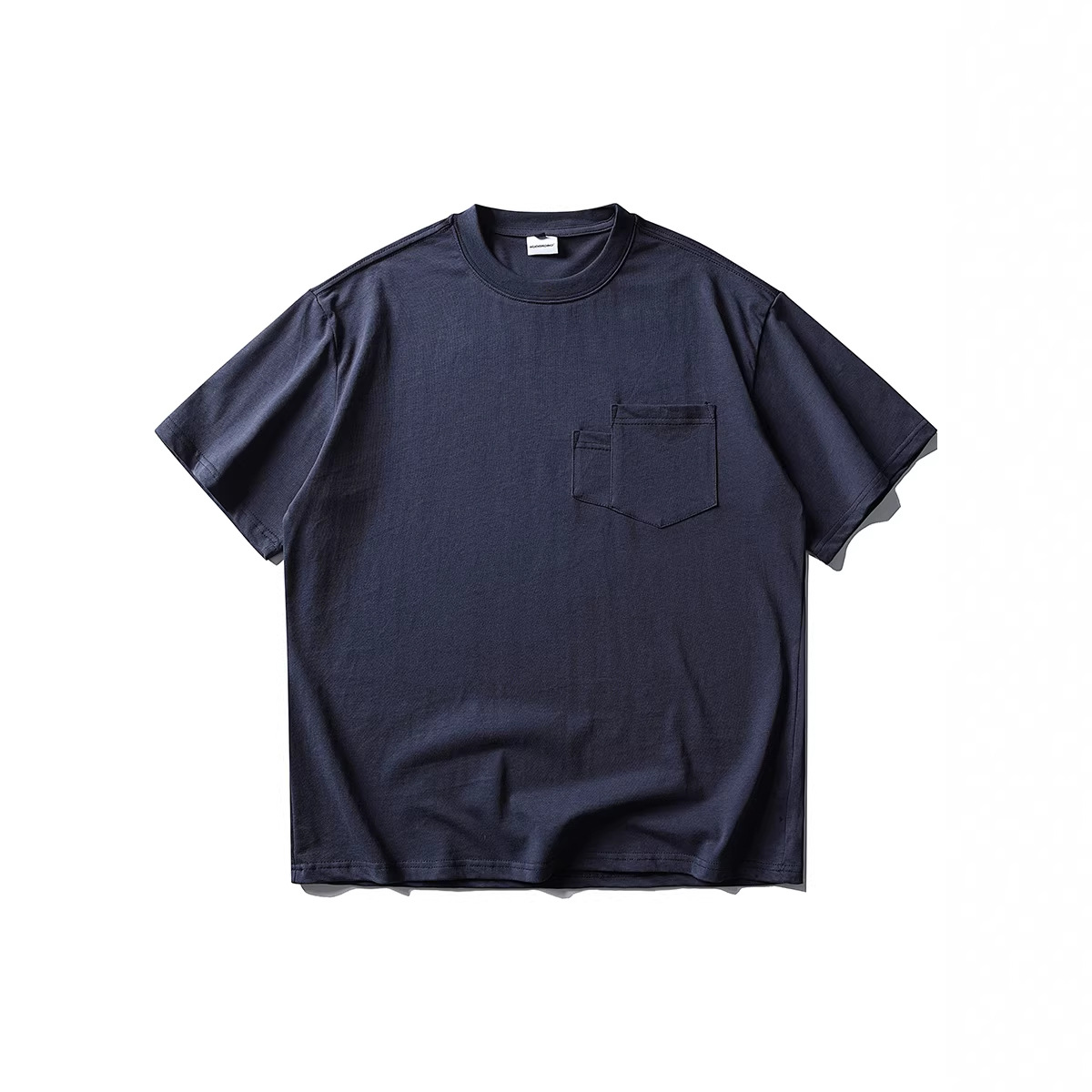 Round neck pocket short sleeved shirt