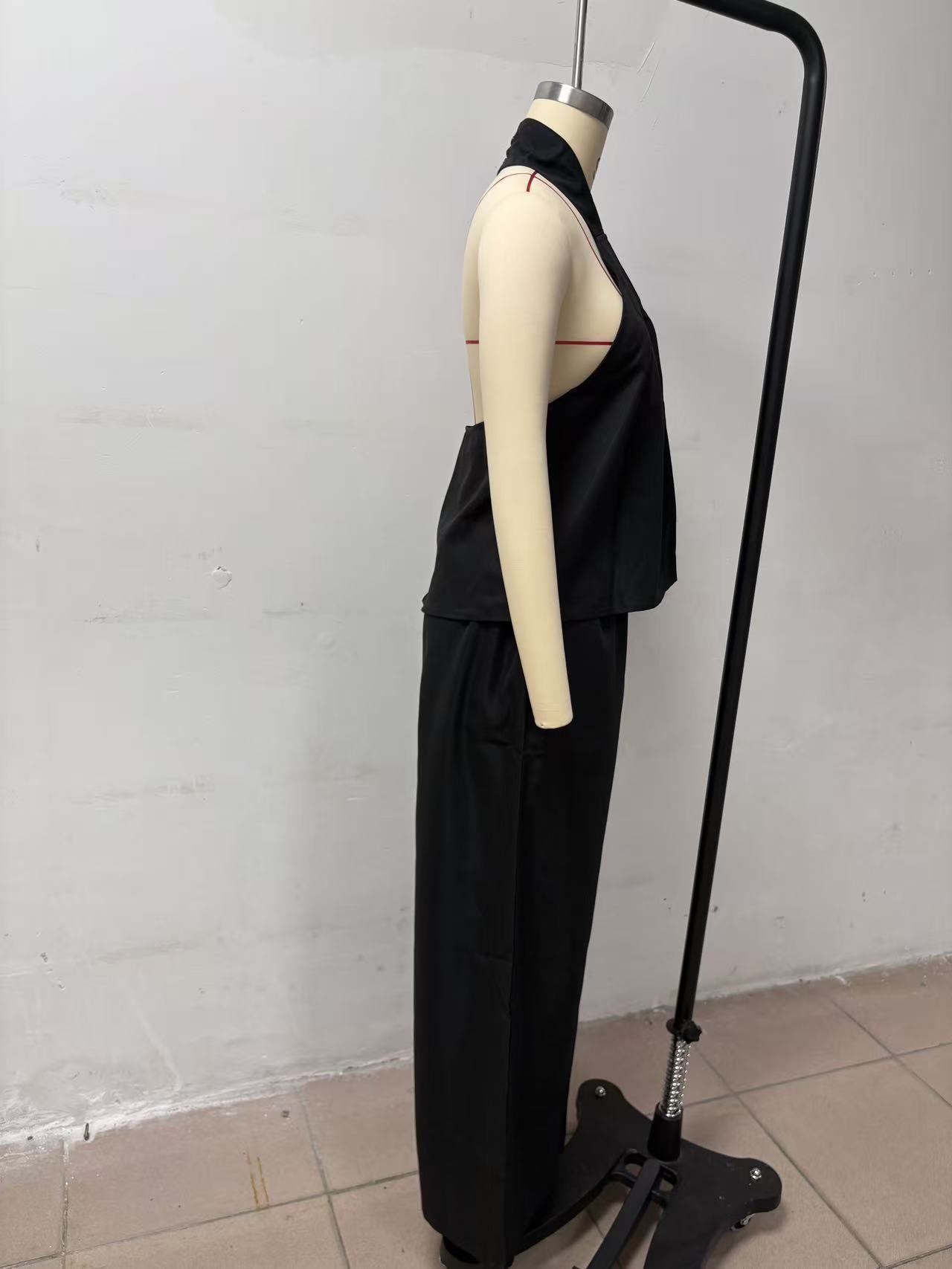 Women's loose sleeveless top and high-waist wide-leg pants set – full outfit styled view
