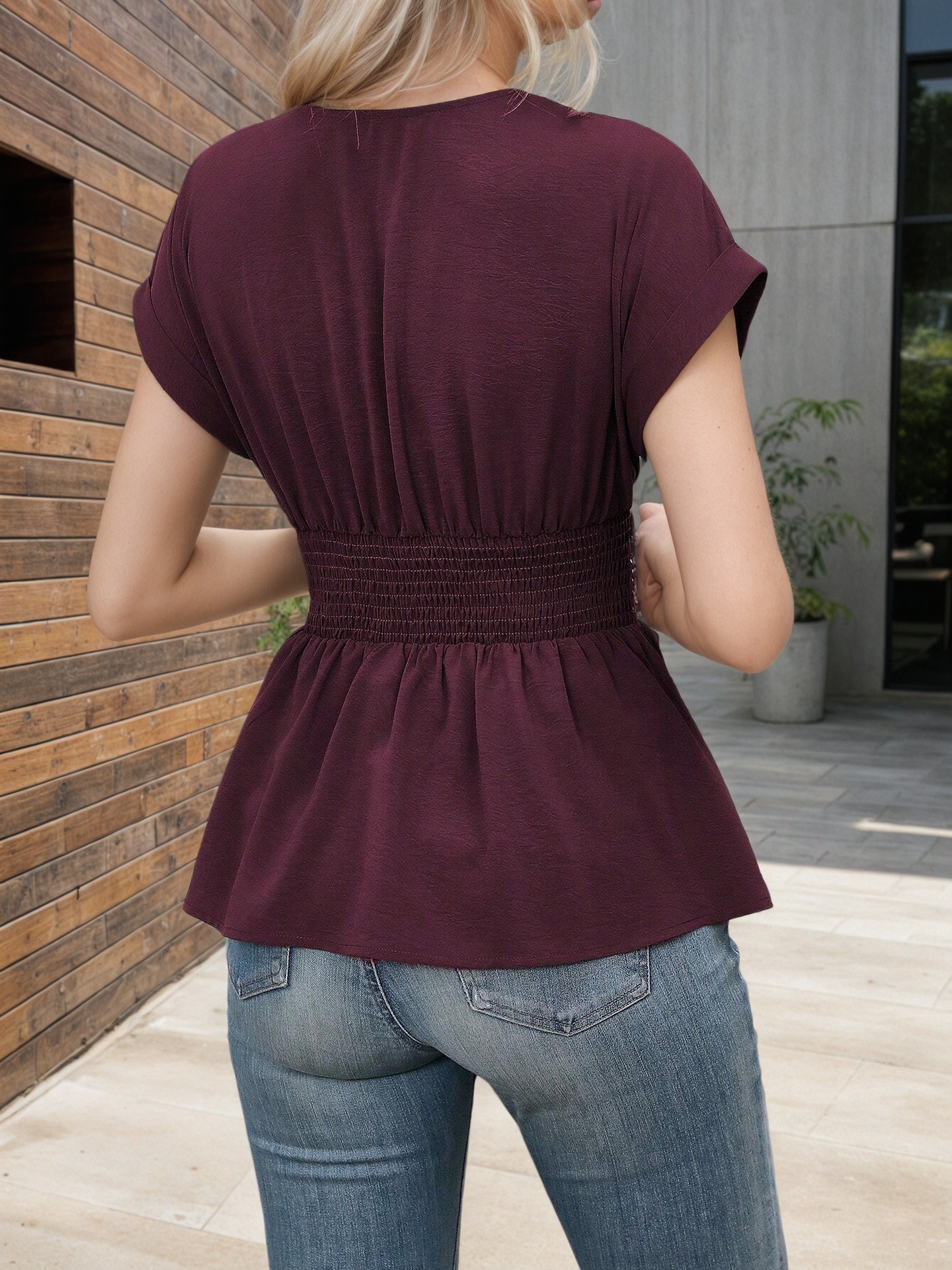 Women's peplum blouse lifestyle outdoor shot – casual chic