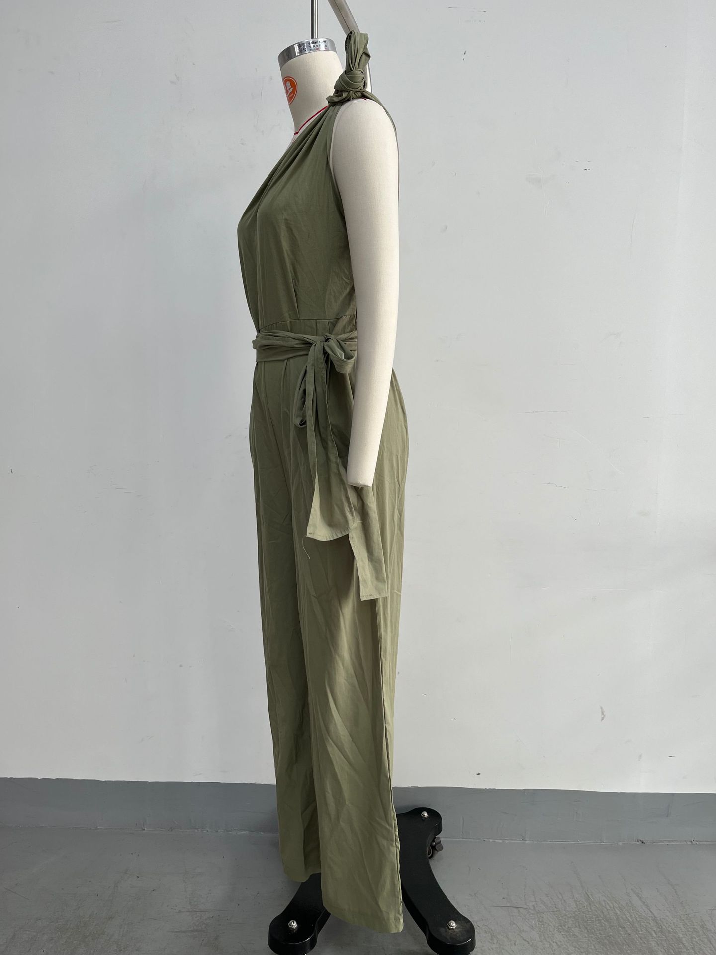 Women's sleeveless halter neck cinched waist jumpsuit in khaki – slim fit high waist casual style