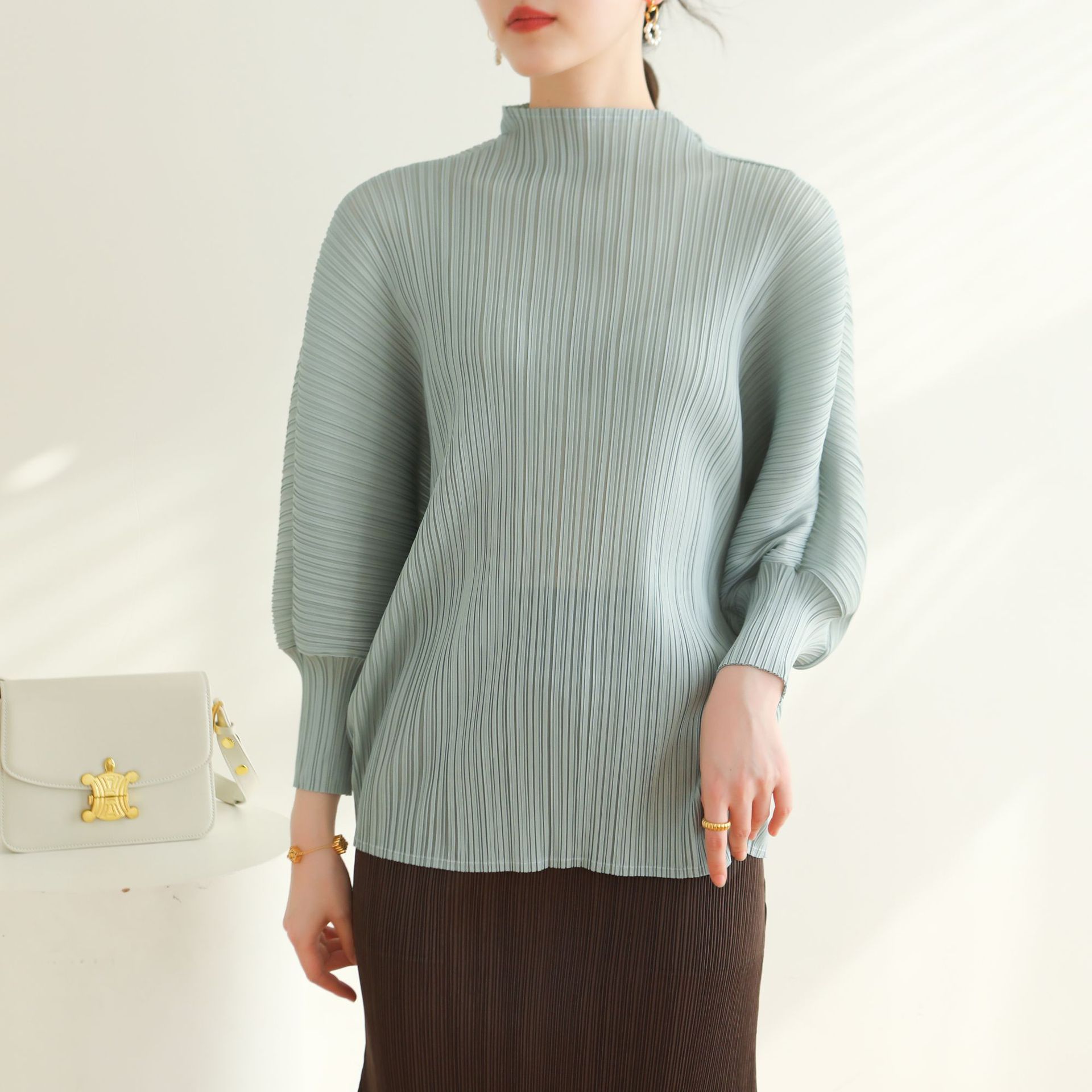 release, Issey Miyake-inspired high-end pleated slimming top with half-high collar, casual and