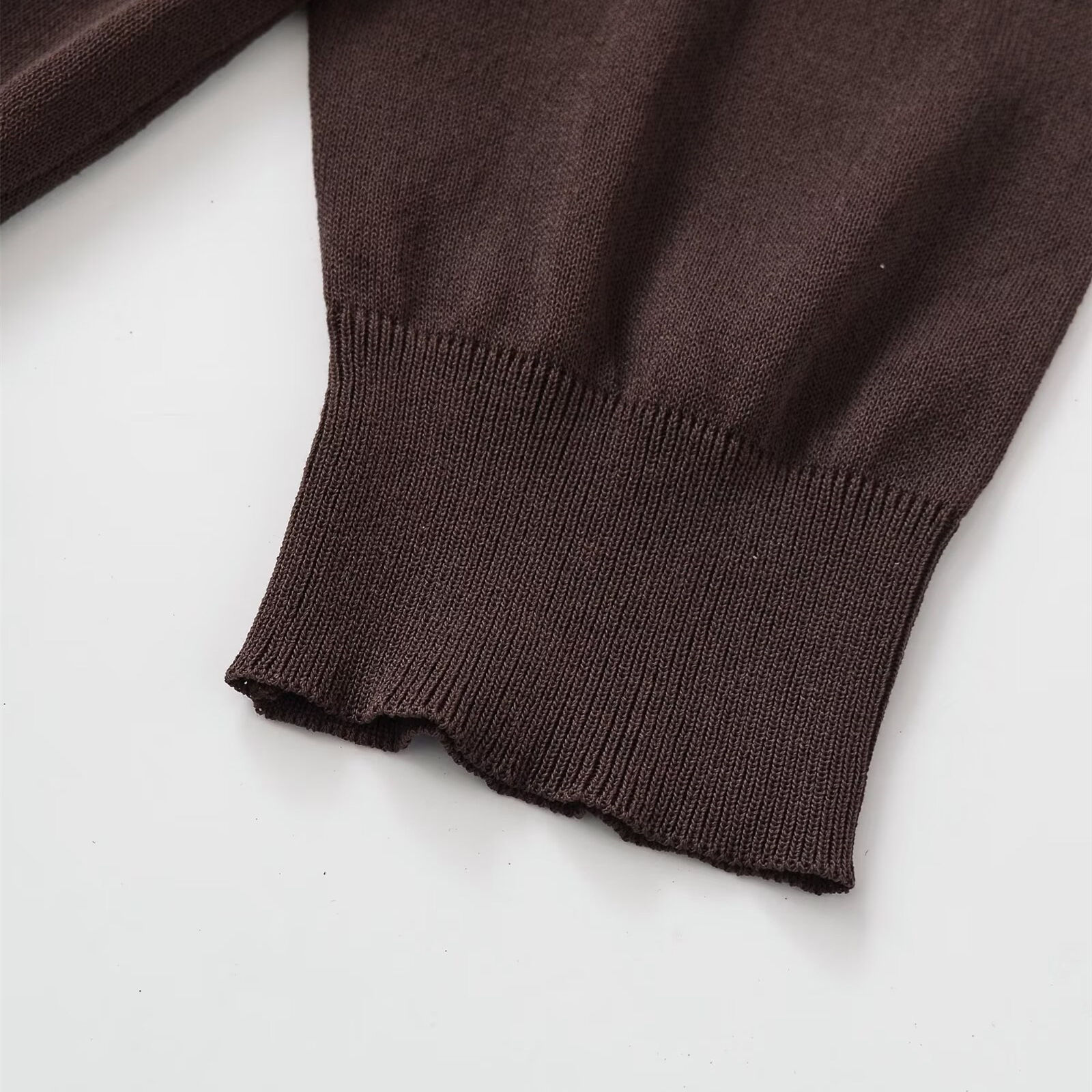 Long sleeved pleated decorative polo knit shirt undefined