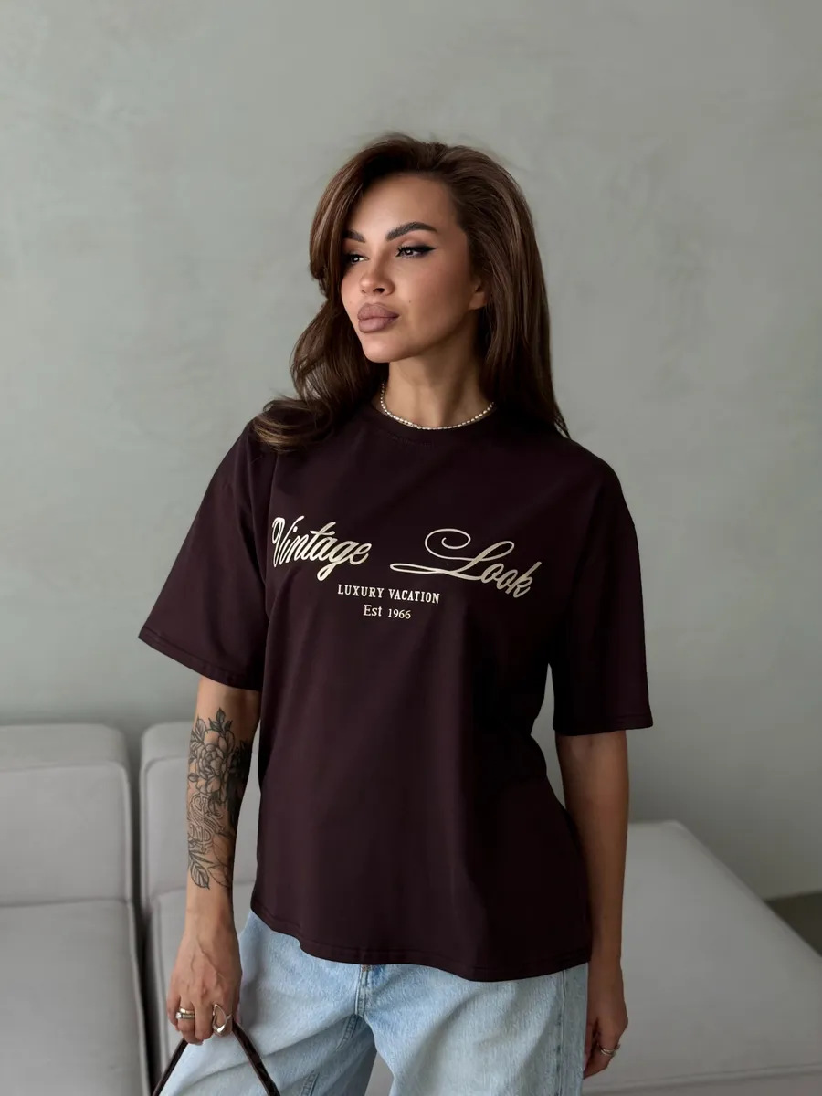 Color options display with white and dark coffee shirts