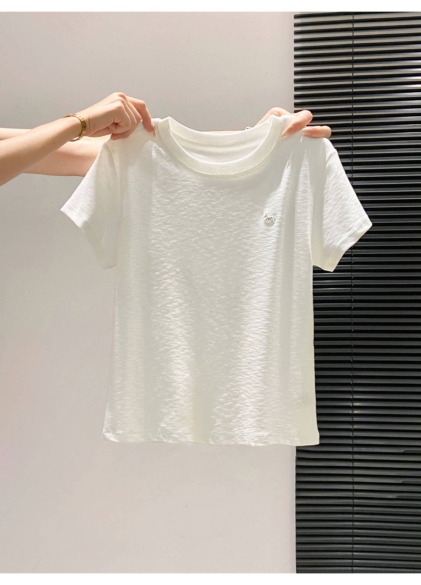 Small Batch Embroidered Patchwork Tee - close-up embroidery