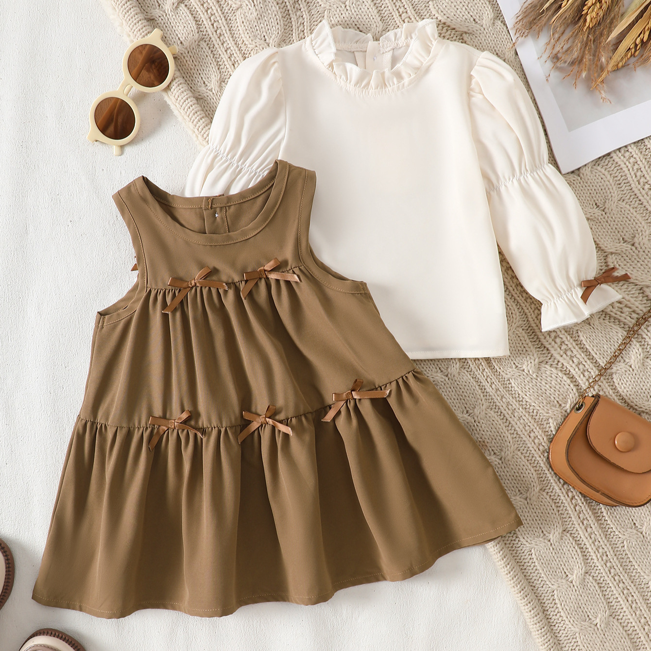 Bow long sleeved top with suspender dress set