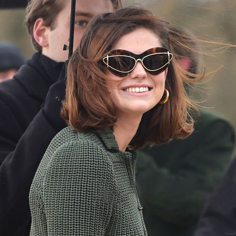 Trendy small frame cat-eye shades for women — on-model