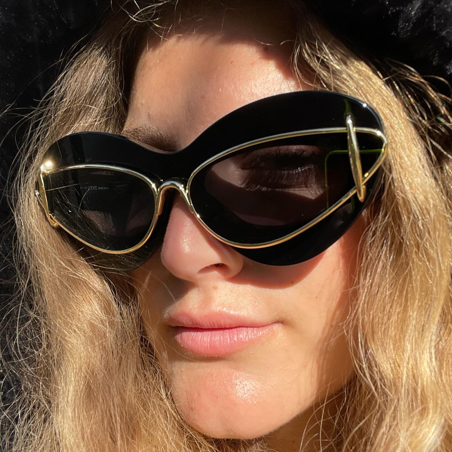 Cat-eye small frame sunglasses — angle view