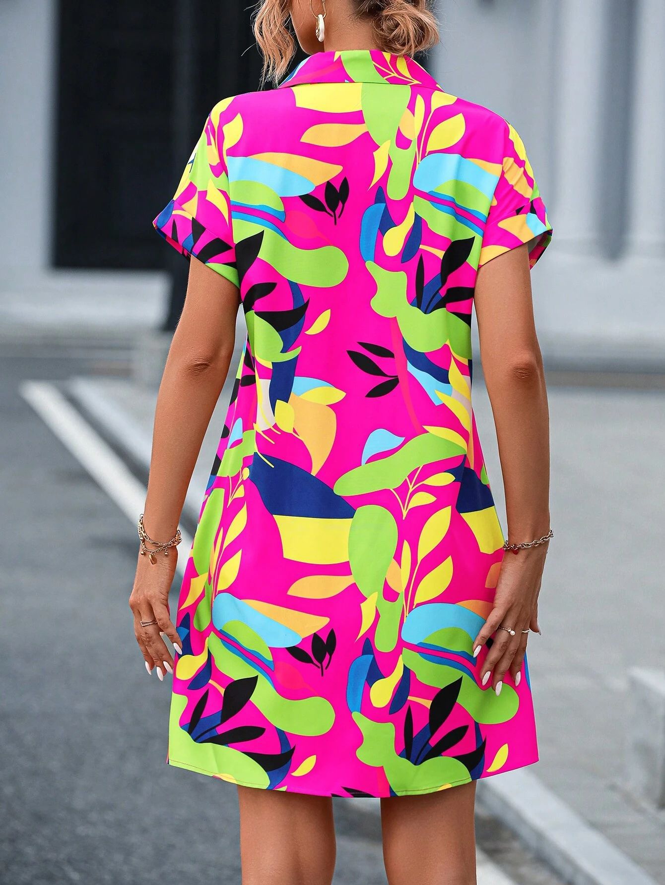 Women's colorful print shirt dress fabric and drape detail