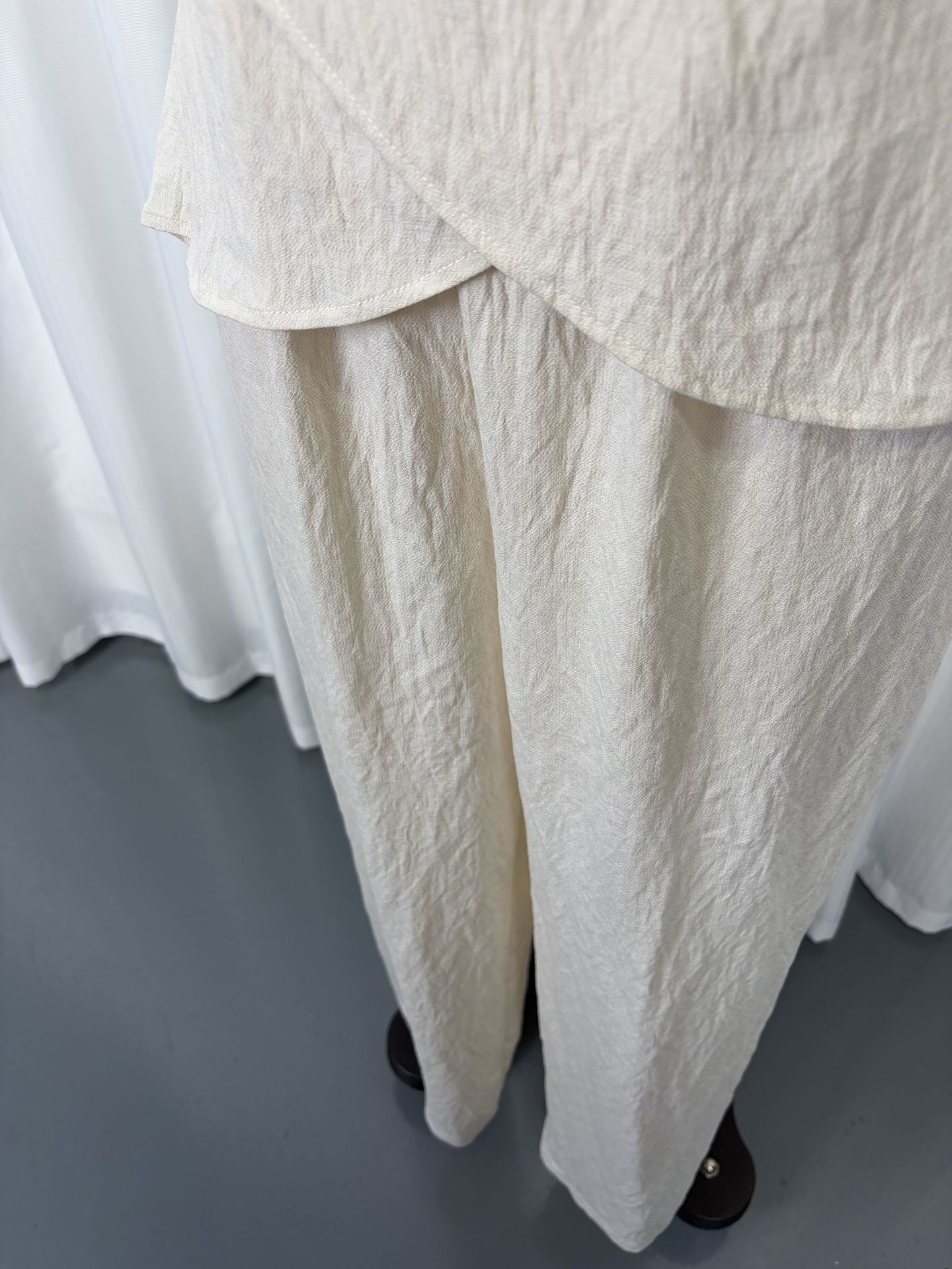 Ivory white co-ord set – sleeveless V-neck waist cinched top and wide leg pants