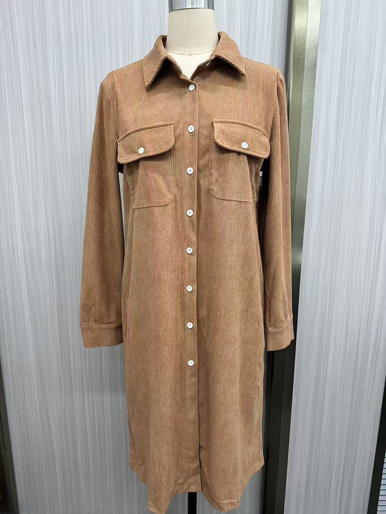 Women's corduroy dress lifestyle shot – styled with boots and tote bag
