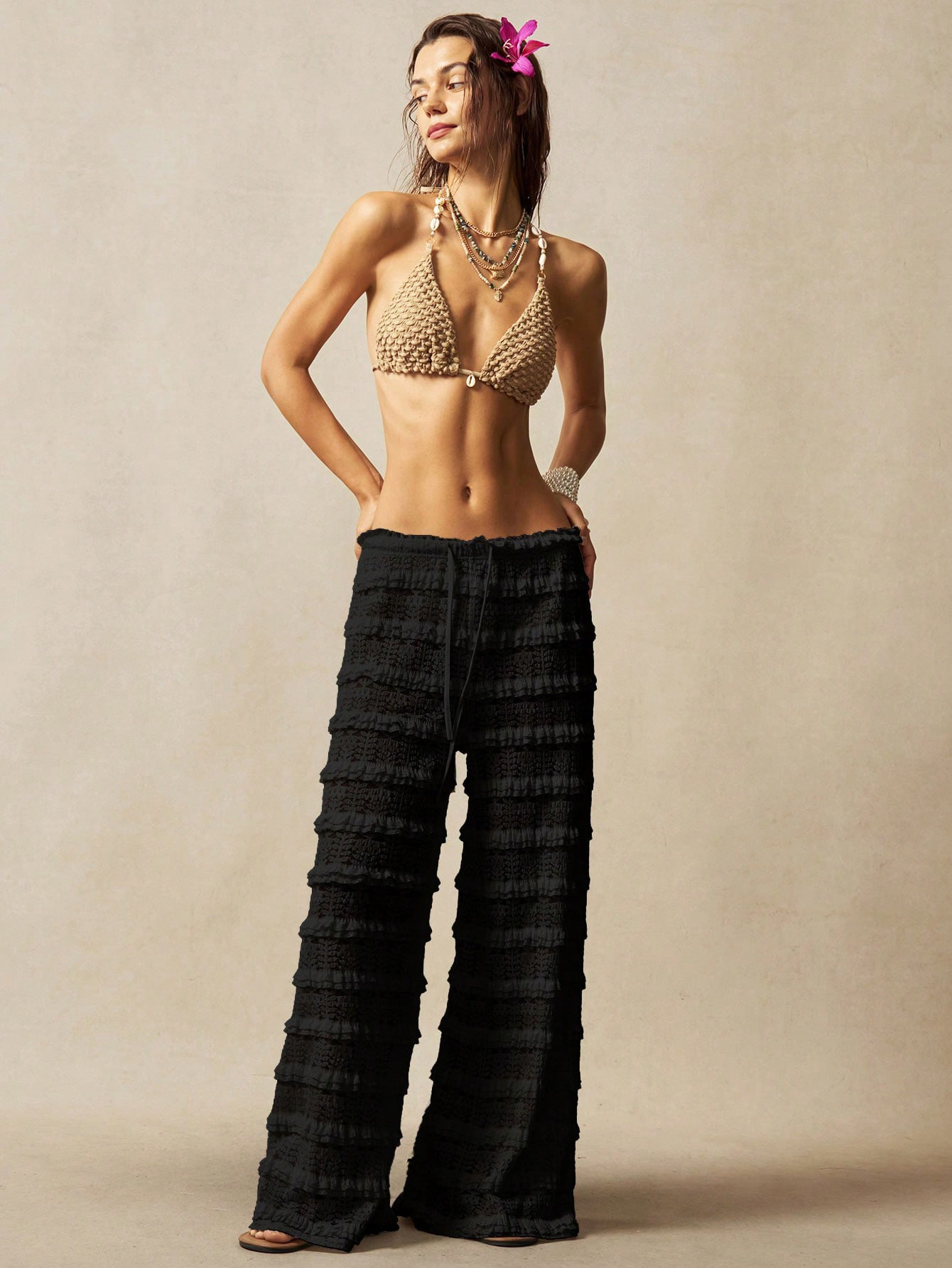 Women's lace pants all-over hollow-out pattern detail