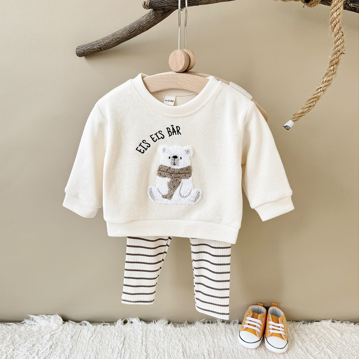 Flat collar sweatshirt with striped casual pants