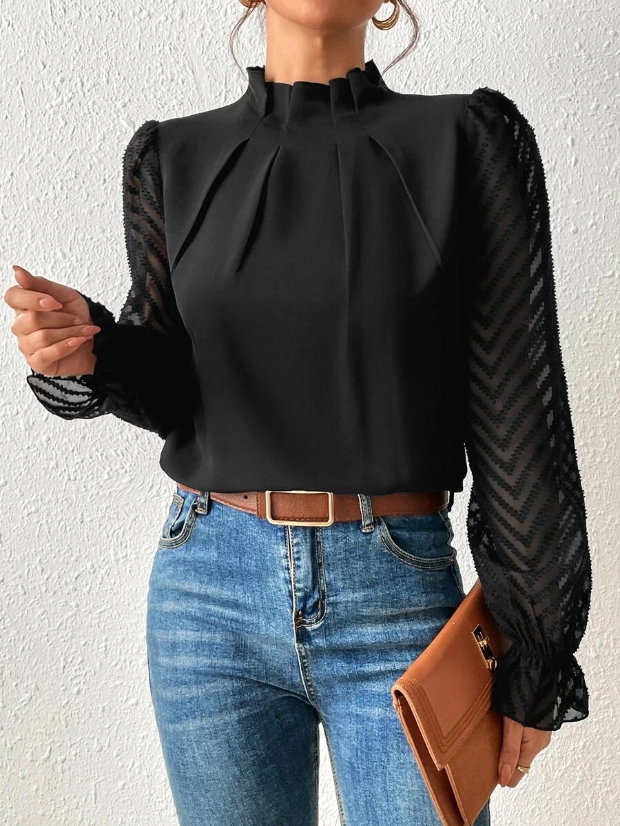 Women's navy blue chiffon top mock neck and sheer sleeve