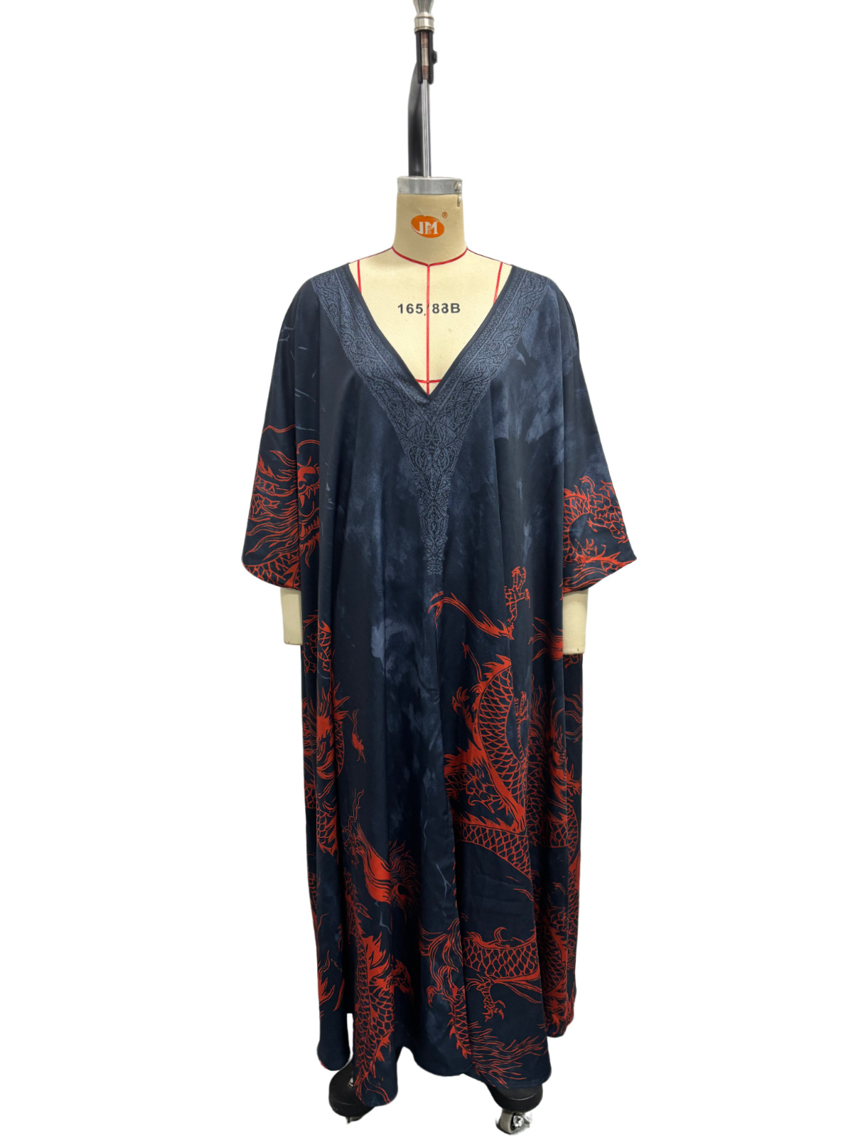 Women's Dragon Print Maxi Dress - dragon print detail close-up on navy blue fabric