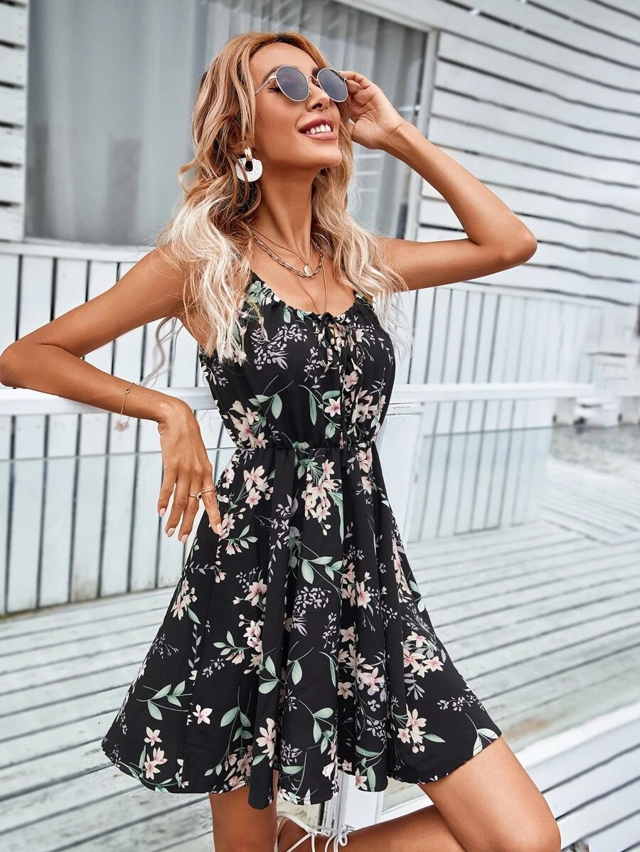 Women's red floral print midi dress lifestyle shot