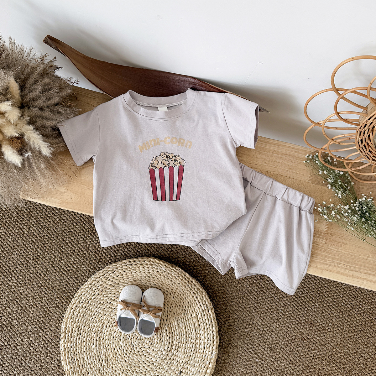 Round neck casual popcorn pattern short sleeved T-shirt+solid color shorts two-piece set