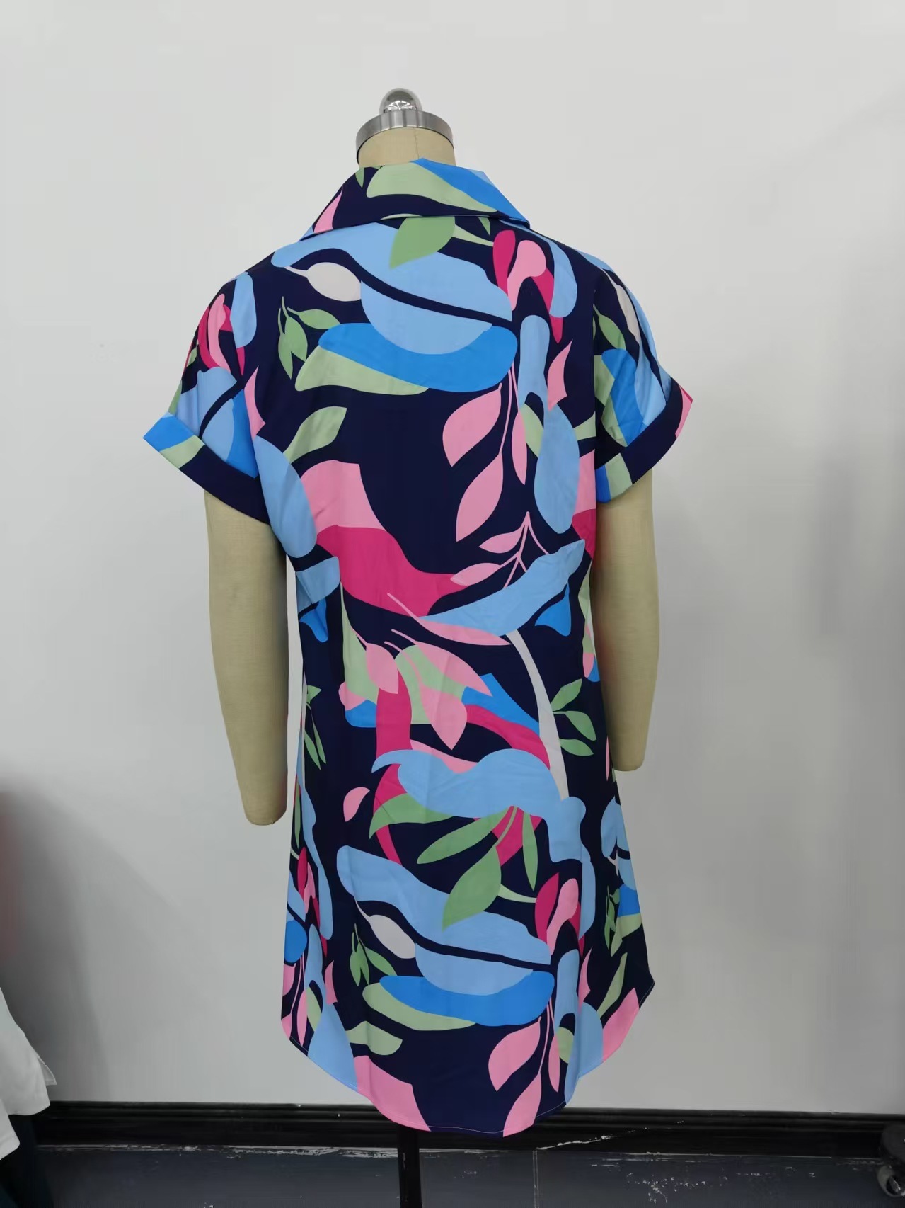 Women's colorful print shirt dress back view – short sleeve midi